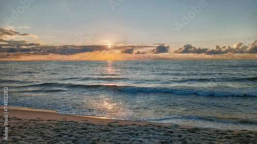 Sunset over the sea photo