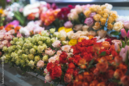 Fotografie Flower shop, lifestyle, selling flowers, buying flowers, small roses, sunflowers