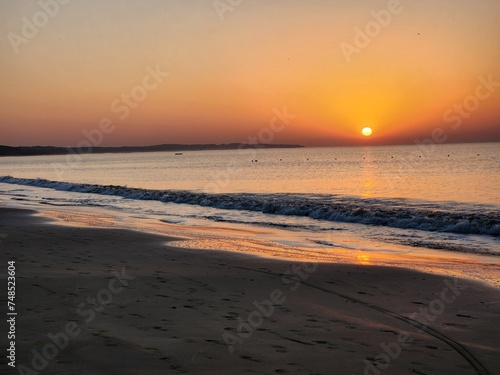 Fototapeta Naklejka Na Ścianę i Meble -  Diu, Dadra and Nagar Haveli and Daman and Diu India - Feb 22 2024: Sunrise at Ghoghla beach - a blue flag beach of Diu.