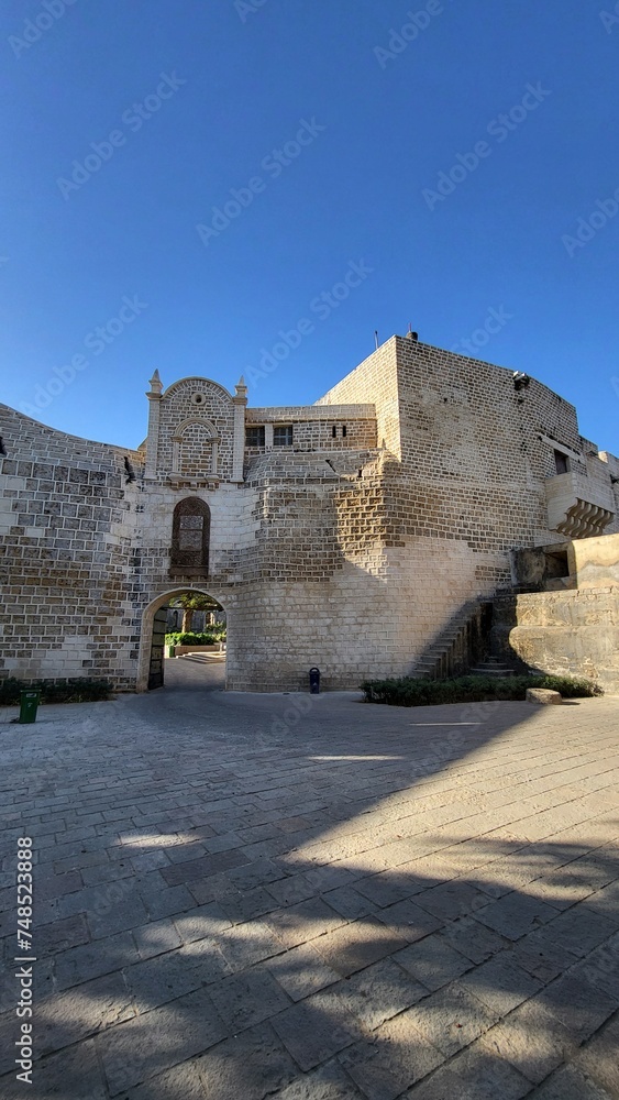 Obraz premium Diu, Dadra and Nagar Haveli and Daman and Diu India - Feb 23 2024: Diu fort - Built in the 16th century by the Portuguese, this sandstone fort features a lighthouse and 3 churches.