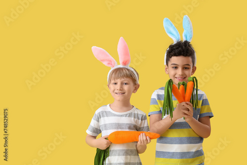 Happy young boys wearing bu...