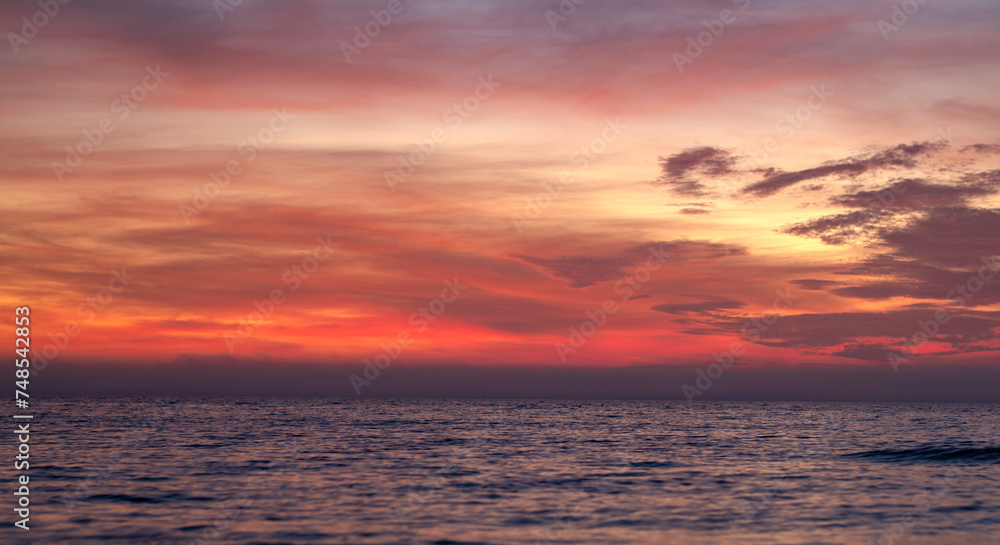 Sunset Clouds background. Dramatic Clouds Sunset Background. Sky with clouds in Sunrise. Sunrise with clouds in various shapes background. Calm Cloud.