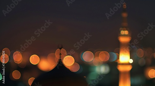  mosque s minaret lit up during the night in Ramadan