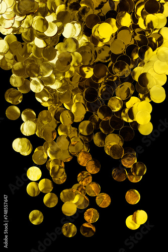 Golden confetti on black