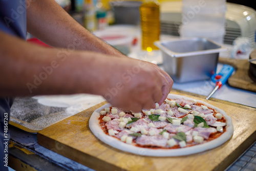 Delicious Italian Pizza being Prepared by Gourmet Chef