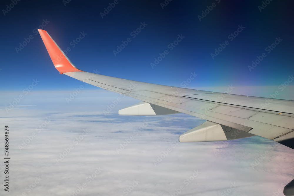 airplane wing sky view porthole airplane wing sky view porthole