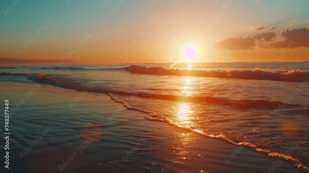 Beautiful sunset over the water on a sandy beach, perfect for travel and nature concepts