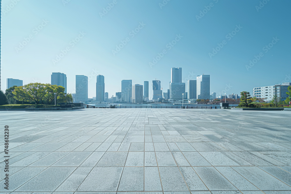 Image of square area with cityscape.
