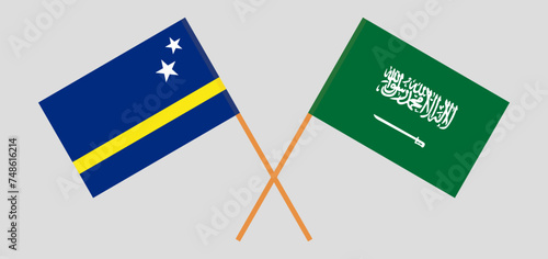 Crossed flags of Country of Curacao and Saudi Arabia. Official colors. Correct proportion