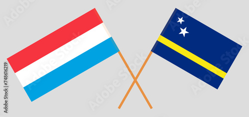 Crossed flags of Luxembourg and Country of Curacao. Official colors. Correct proportion