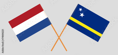 Crossed flags of the Netherlands and Country of Curacao. Official colors. Correct proportion