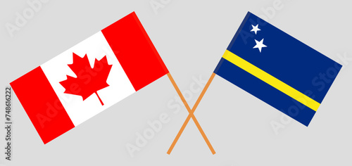 Crossed flags of Canada and Country of Curacao. Official colors. Correct proportion