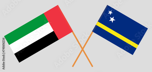 Crossed flags of the United Arab Emirates and Country of Curacao. Official colors. Correct proportion