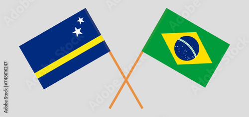 Crossed flags of Country of Curacao and Brazil. Official colors. Correct proportion