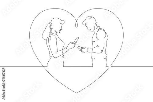 Online digital date for lovers. Couple on a date. People look at the phone screen. Digital age and lack of personal interaction.Internet addiction, social networking concept.)