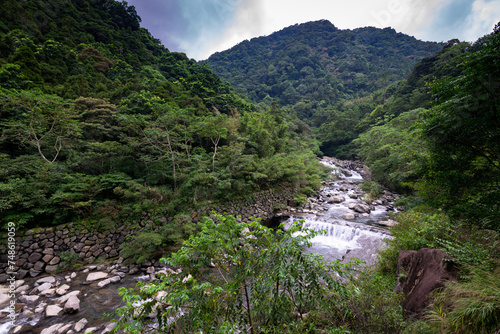 Stream go through the valley with many rocks, in Sanxia, New Taipei City, Taiwan. photo