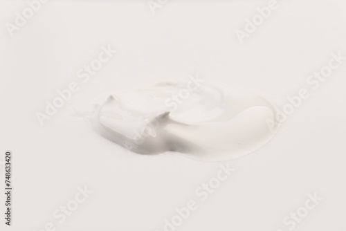 Paint spot, isolated on white background. Glossy akril paint. Abstract trace shape. Drops of paint.