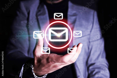 Businessman with virtual email notification icon