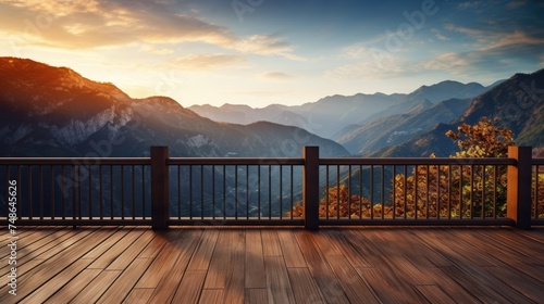 Wooden balcony with a beautiful view,Wooden balcony with beautiful mountains during sunset © CStock
