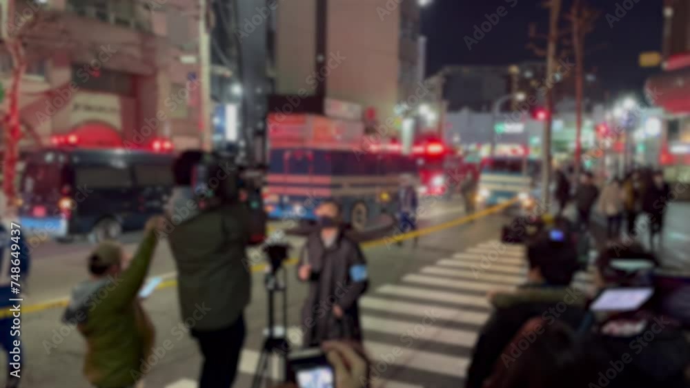 TOKYO, JAPAN - JAN 2022 : View of Police car with red beacon light. Japanese crime scene and emergency concept video. Blurred shot. TOKYO, JAPAN - JAN 2022 : View of Police car with red beacon light. Japanese crime scene and emergency concept video. Blurred shot.