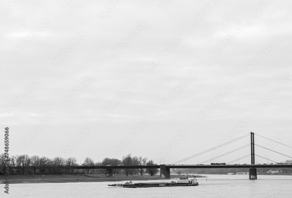 Cargo boat on the river Rhine in Düsseldorf, Germany