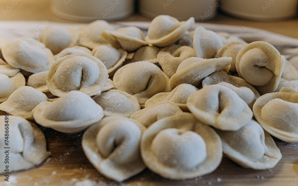 homemade dumplings with filling. cooking hobby.preparation of semi-finished products.dough ravioli.National cuisine.aesthetic appearance.
meat in dough.
Yummy.
promotion and advertising.
tasty food.