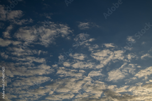 Beautiful blue sky with white clouds. © yotrakbutda