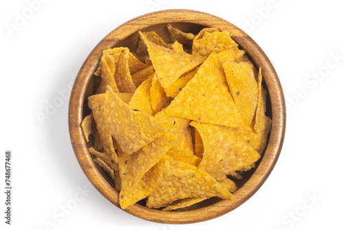 Crispy corn tortilla nachos chips top view in a wooden bowl isolated on white background clipping path