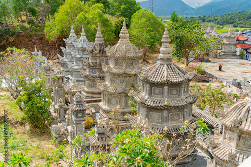 Bas-relief patterns of weather towers.
Thong Lam Lo Son Pagoda. Vietnam, a suburb of Nha Trang. The country's largest statue of Buddha Amitabha. photo