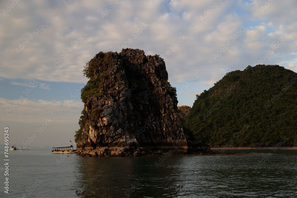 The limestone formations of Halong Bay at sunset, Vietnam