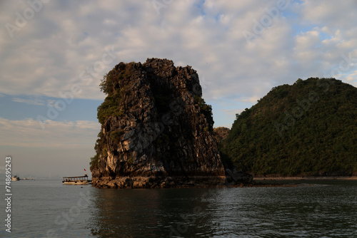The limestone formations of Halong Bay at sunset  Vietnam