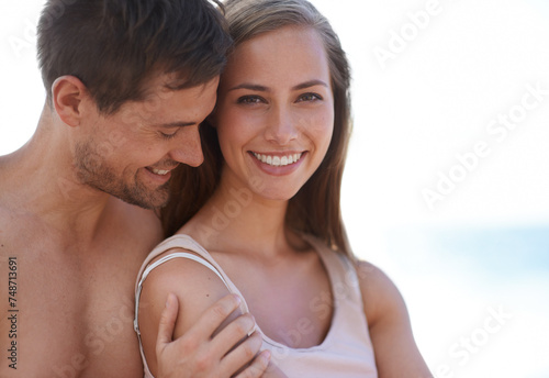Couple, portrait and hug on beach in summer, outdoor with love on vacation or holiday in Florida. Romantic, embrace or woman with care, support and kindness in marriage to man and relax on adventure