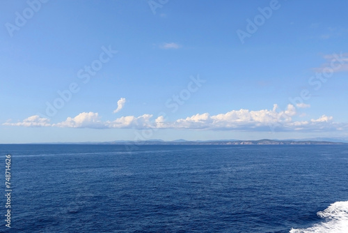Bright blue sea and clear sky. Copy space.