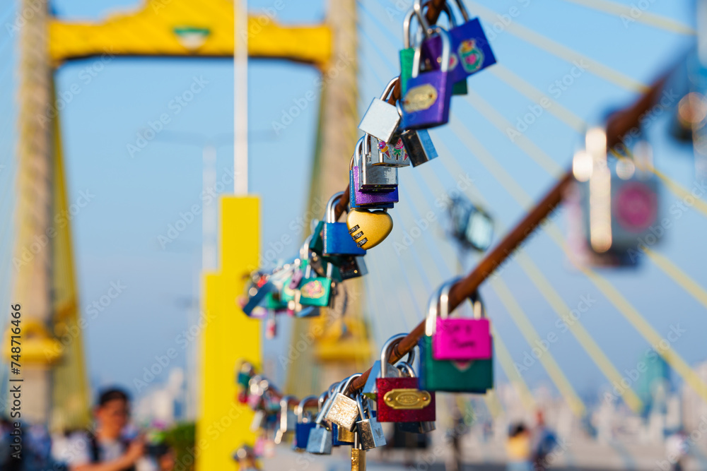 Love locks hanging on parallel bridge to Rama 9 Bridge Chao Phraya River, Thailand's first parallel bridge, Expressway road traffic an important infrastructure in Thailand, Love locks hanging on parallel bridge to Rama 9 Bridge Chao Phraya River, Thailand's first parallel bridge, Expressway road traffic an important infrastructure in Thailand,