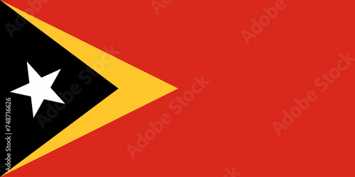 Close-up of black white, yellow and red national flag of Asian country of East Timor with white star. Illustration made March 1st, 2024, Zurich, Switzerland. photo