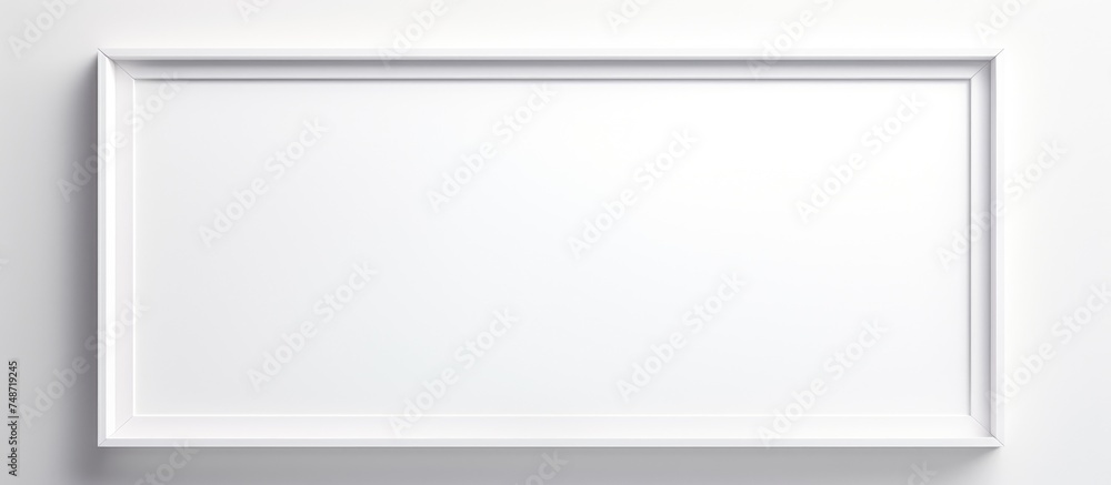 A rectangular white picture frame hangs on a wall, showcasing a realistic mockup for a 1x2 horizontal landscape photograph. The frame is made of paper, wood, or plastic, and is blank, A rectangular white picture frame hangs on a wall, showcasing a realistic mockup for a 1x2 horizontal landscape photograph. The frame is made of paper, wood, or plastic, and is blank,