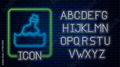 Glowing neon Glass bottle with a message in water icon isolated on brick wall background. Letter in the bottle. Pirates symbol. Neon light alphabet. Vector