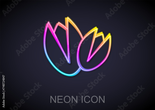 Glowing neon line Pistachio nuts icon isolated on black background. Vector