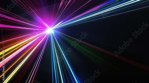 Colorful laserlights on black background.