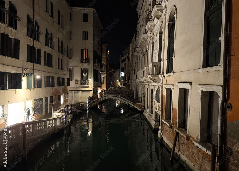 Venice canal at night, mystery and romance