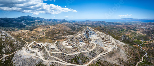 Panoramic aerial view of the mountain landscape of Naxos island with a large marble mine, Cyclades, Greece