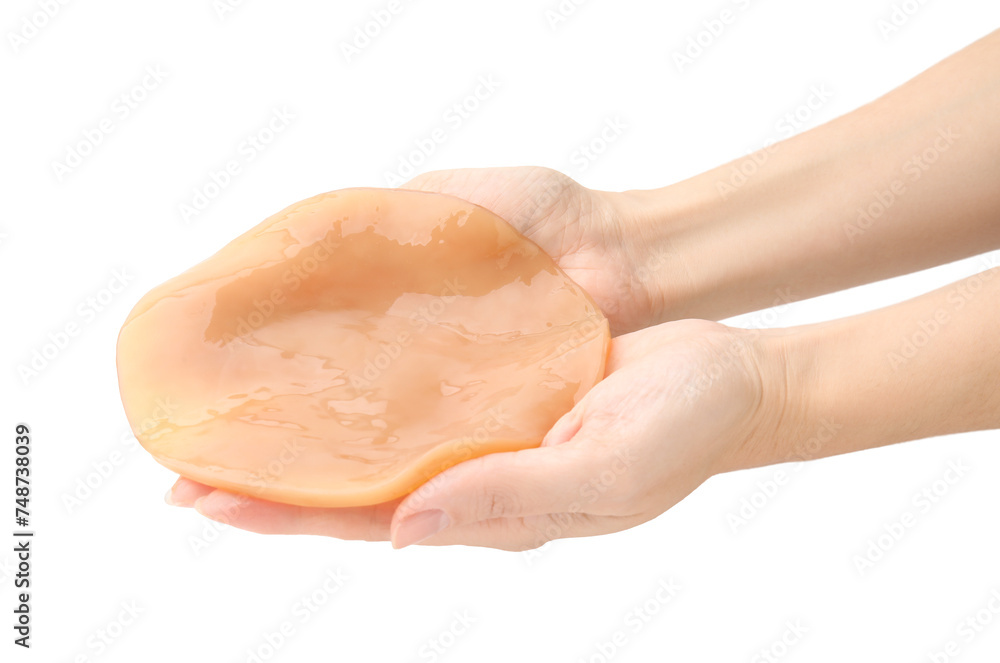 Fototapeta premium Making kombucha. Woman holding Scoby fungus on white background, closeup
