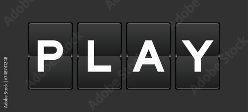 Black color analog flip board with word play on gray background
