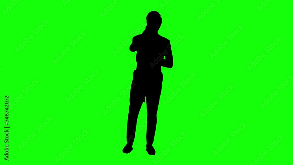 Silhouette man singer. Singing song and dancing on green screen background. Video 4K for compositing and presentation. Silhouette man singer. Singing song and dancing on green screen background. Video 4K for compositing and presentation.
