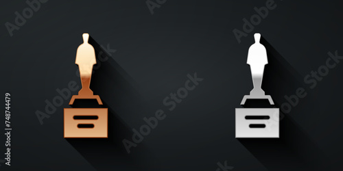 Gold and silver Movie trophy icon isolated on black background. Academy award icon. Films and cinema symbol. Long shadow style. Vector