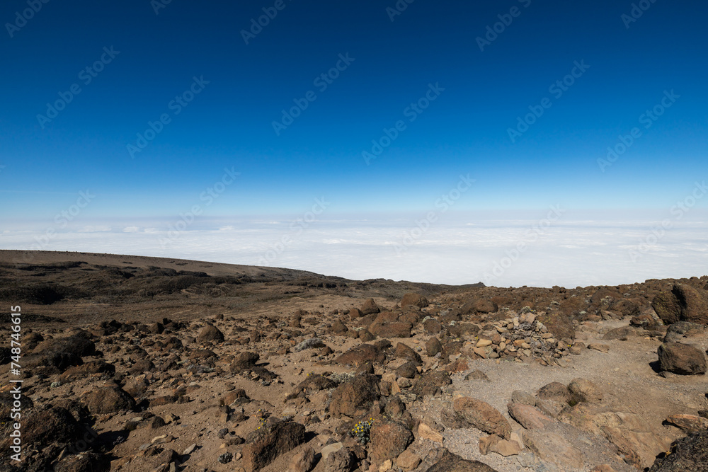 Above the Clouds: Rocky Peaks and Endless Skies