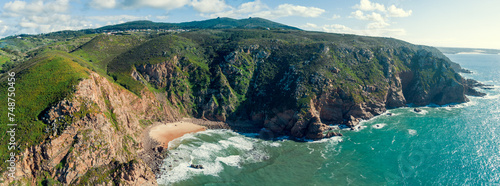 Panoramic view of Cabo da Roca. Rocky seascape. Assentiz Beach. Region of Cape Roca, Atlantic Ocean, Portugal. Horizontal banner photo