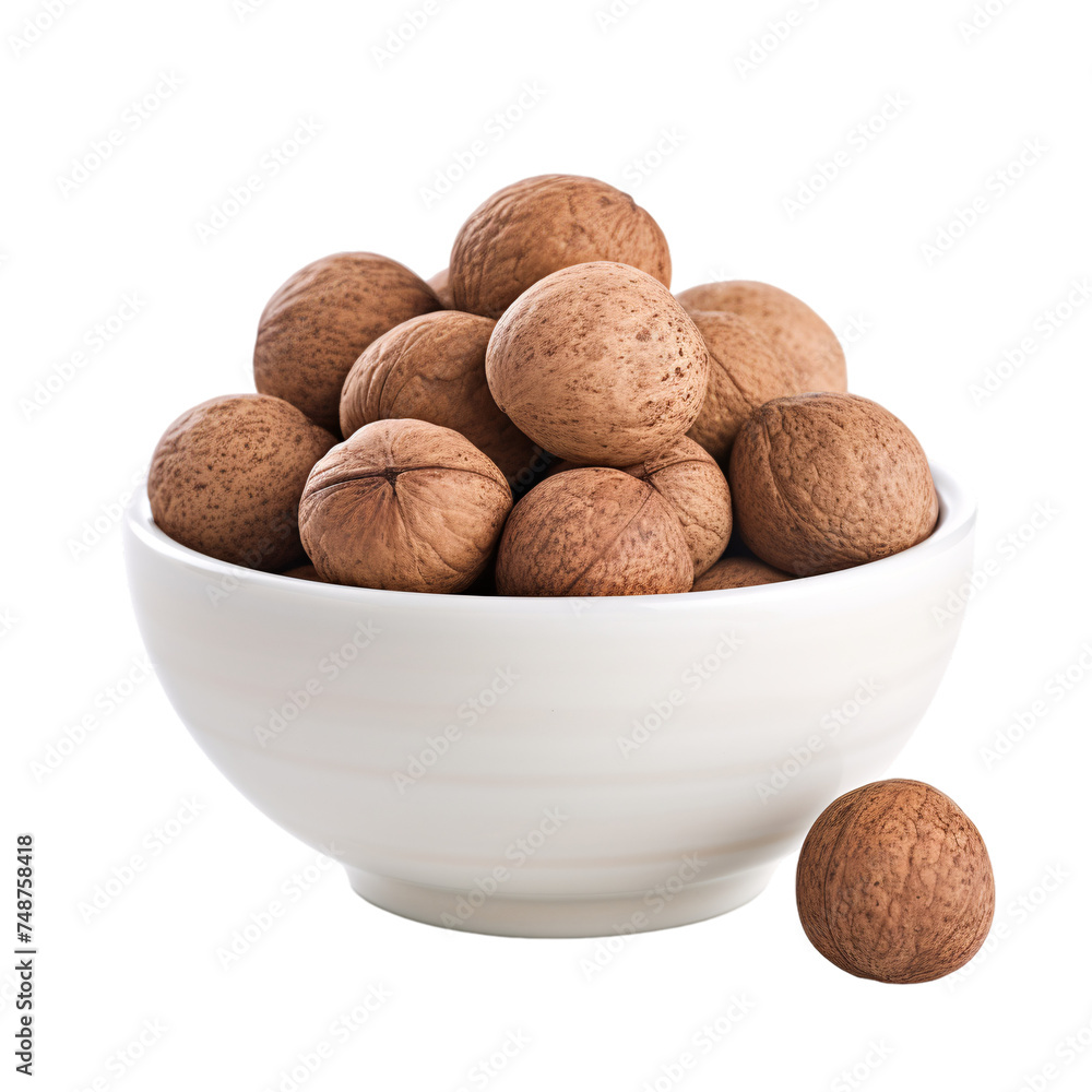 Fresh nutmeg in a white bowl in white background Fresh nutmeg in a white bowl in white background