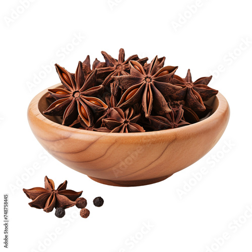 Star anise in a wooden bowl isolated on white background