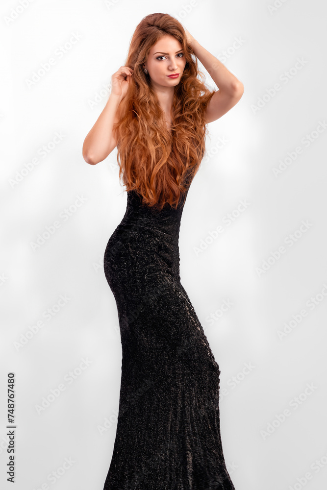portrait of a beautiful woman with long red hair. portrait of a beautiful woman with long red hair.